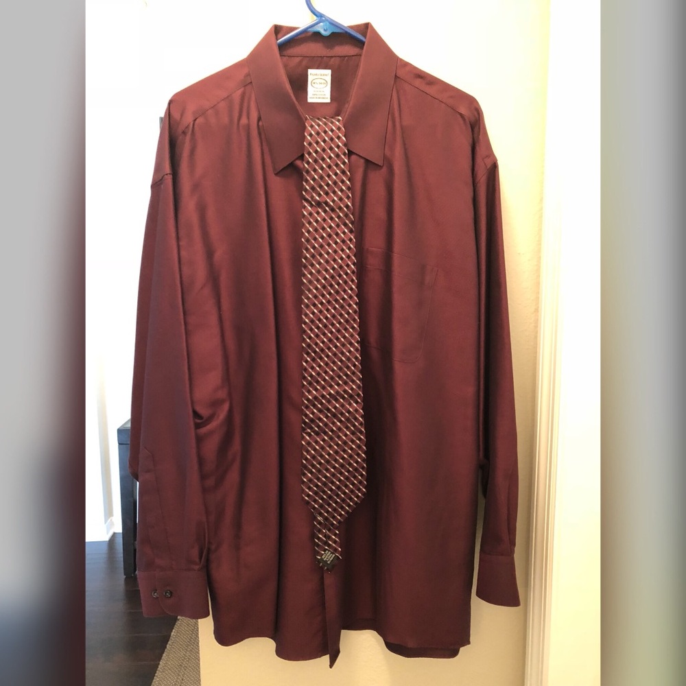 Burgundy dress shirt with tie.